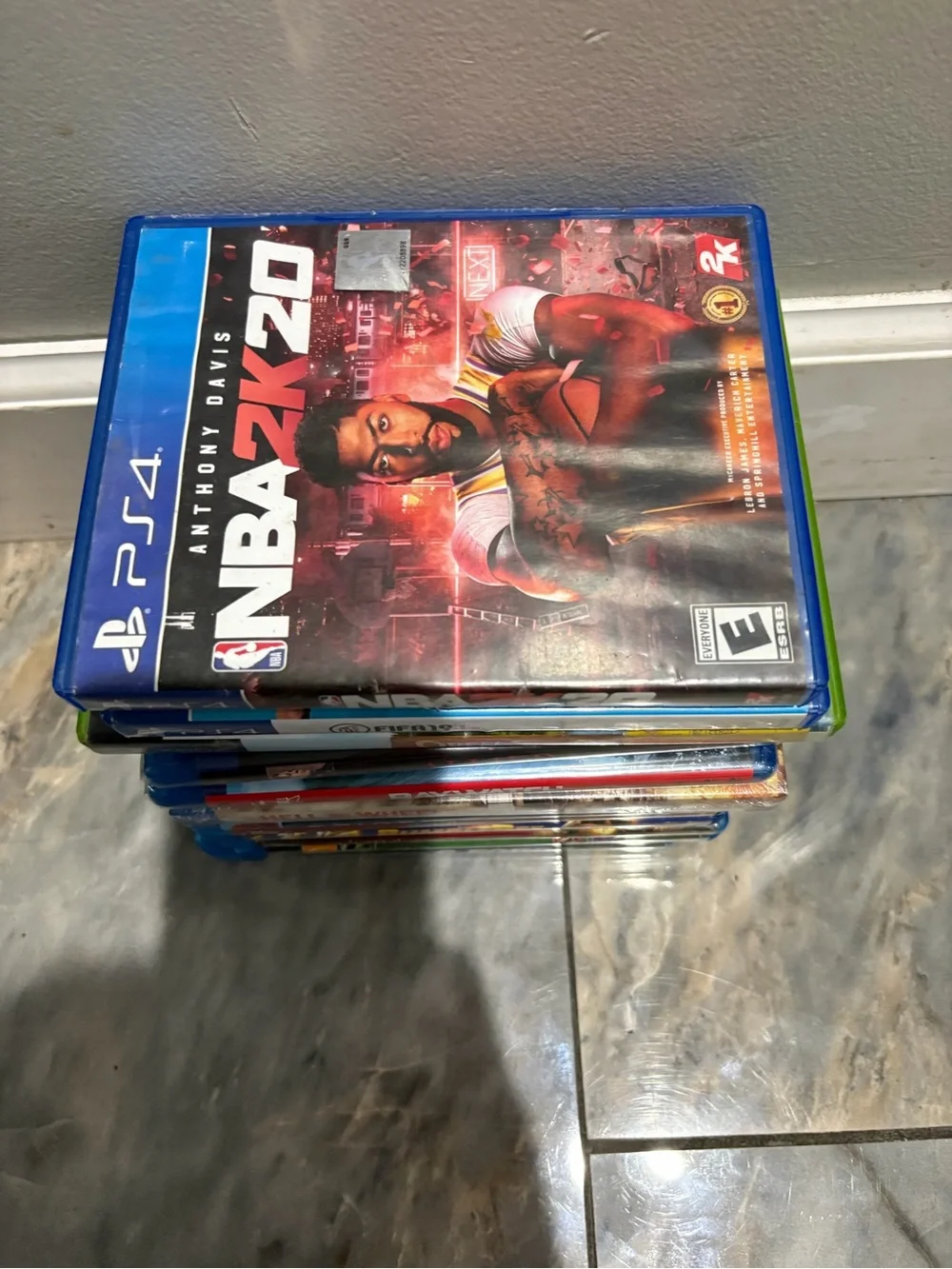 Stack of Mixed Blu-ray & PS4 Games - Assorted Titles in Blue Cases
